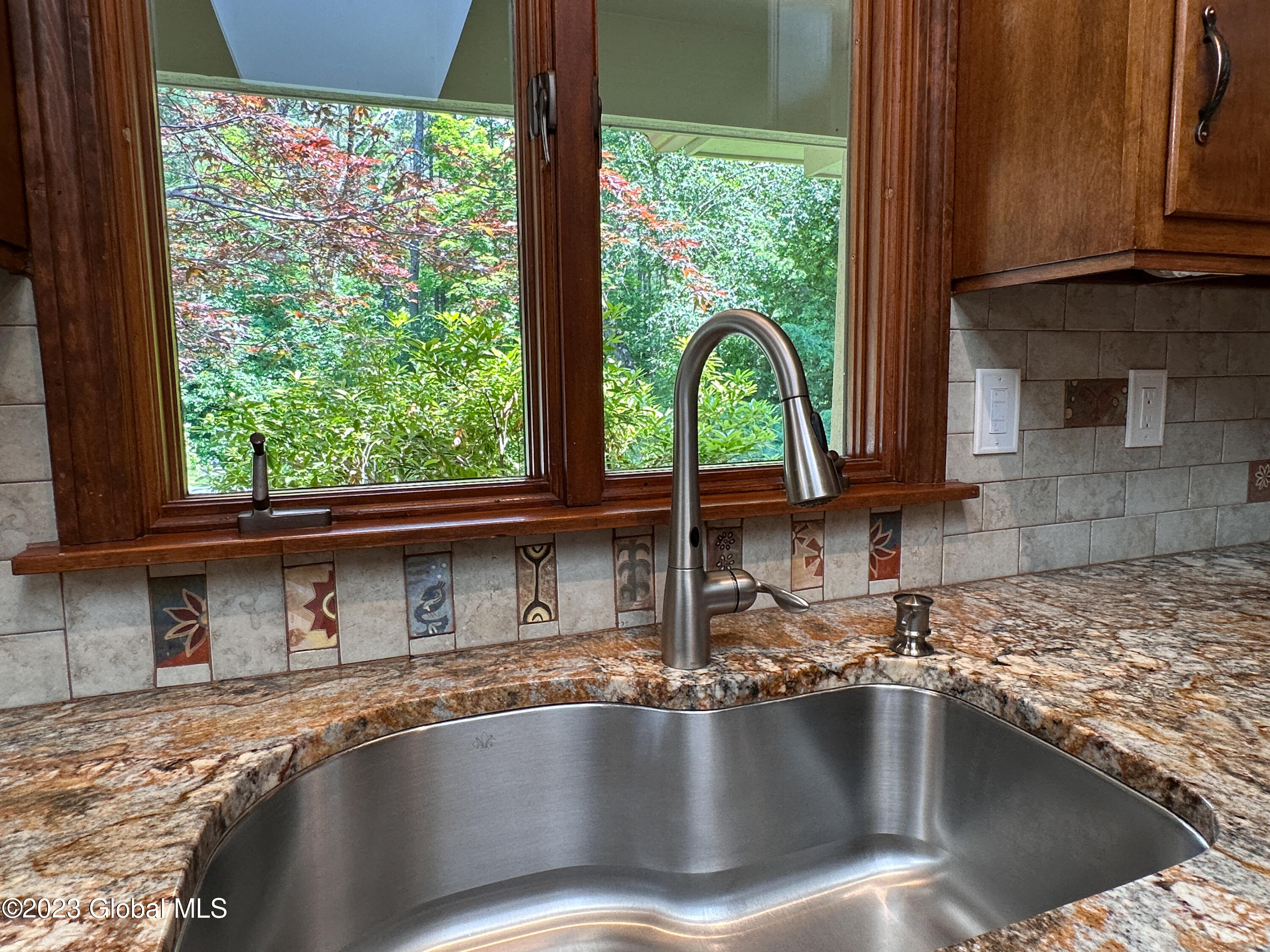 311 Gurney Lane in Queensbury, NY Listed For 719,000.00 by Pamela